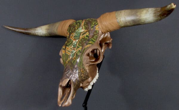 Gordon Plaid of Eight Pond Farms skull with horns on a stand.
