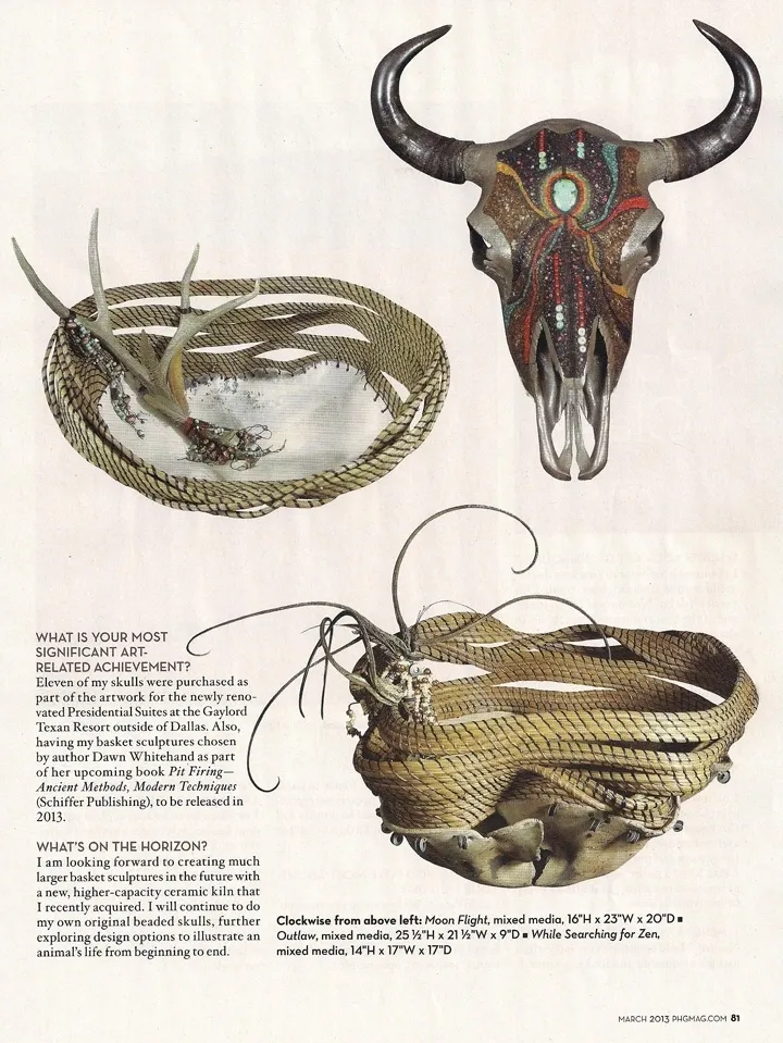 A picture of a basket with antlers and a cow skull.