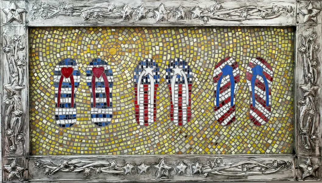 A mosaic of four flip flops in a frame.