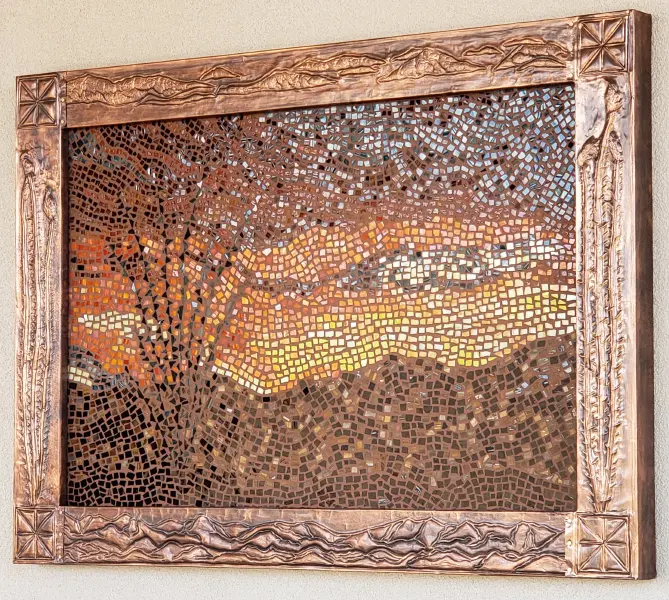 A mosaic art on a wall.