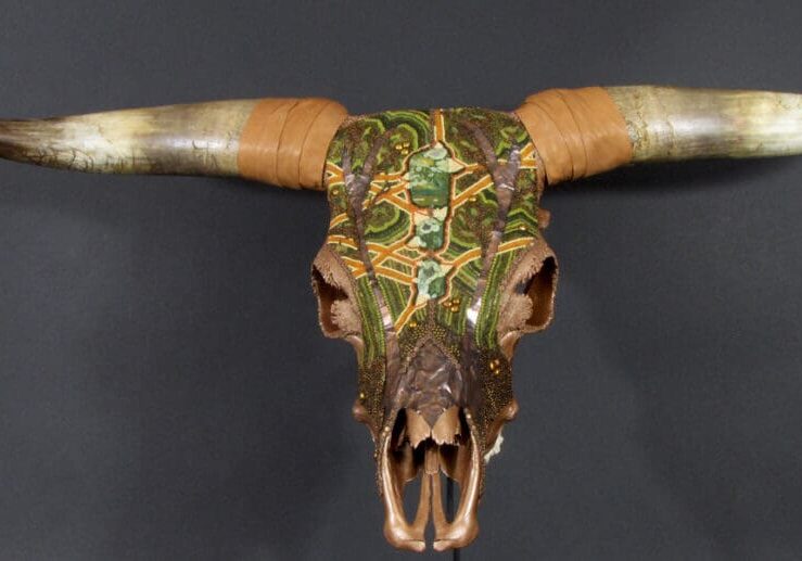 A Gordon Plaid of Eight Pond Farms skull with horns on a wall.