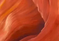 A painting of a canyon with red and orange swirls.